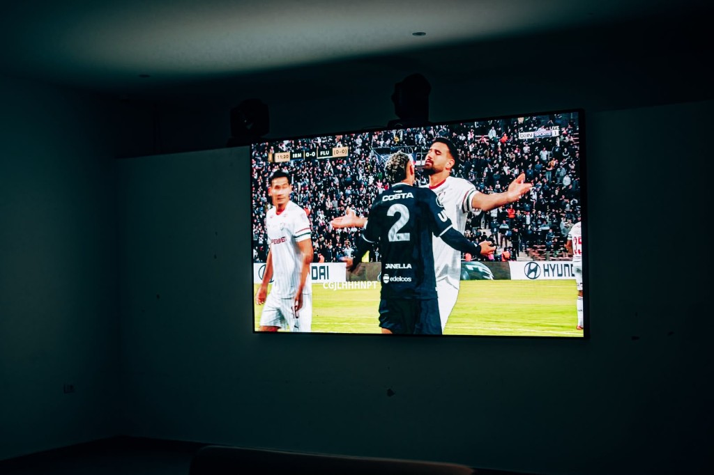 Live football on a large screen at Mamma Mia